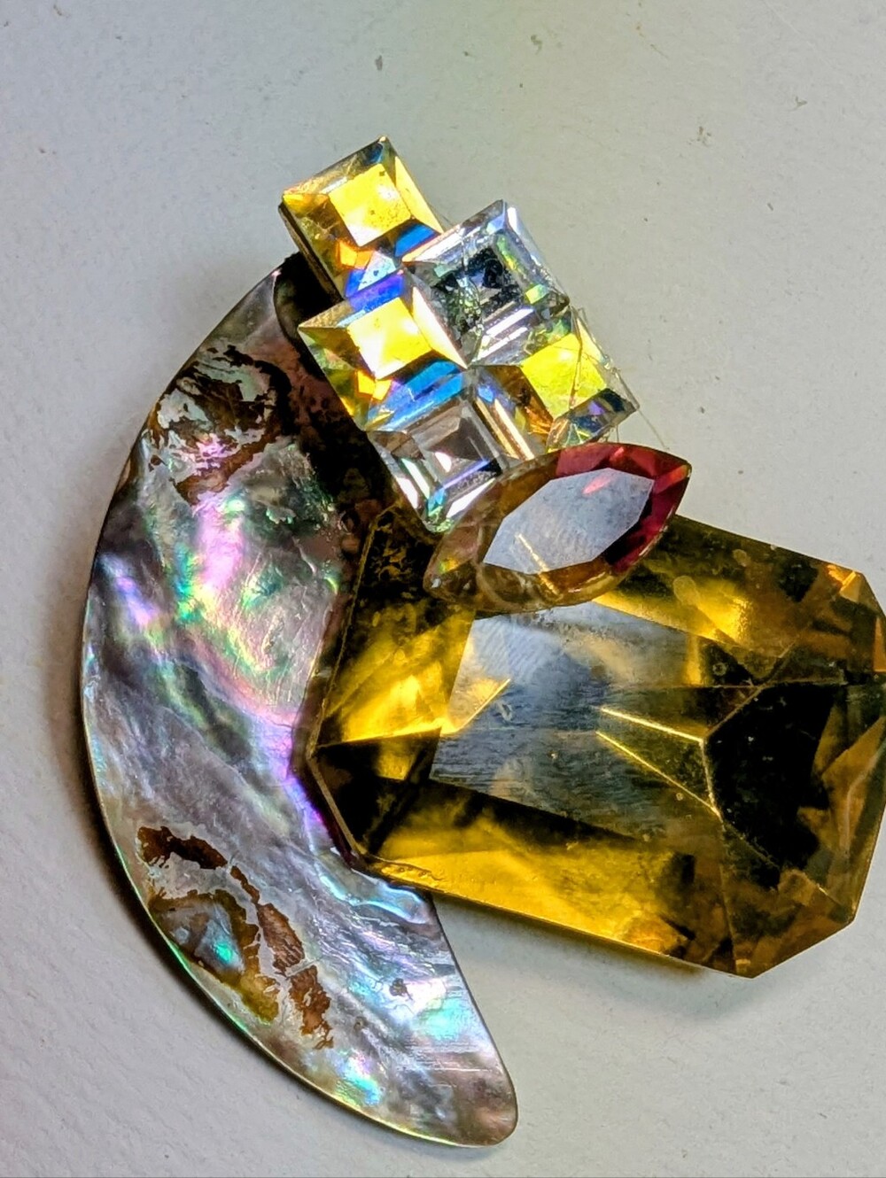 Wendy Gell pin abalone,Swarovski jewels,large golden emerald cut.